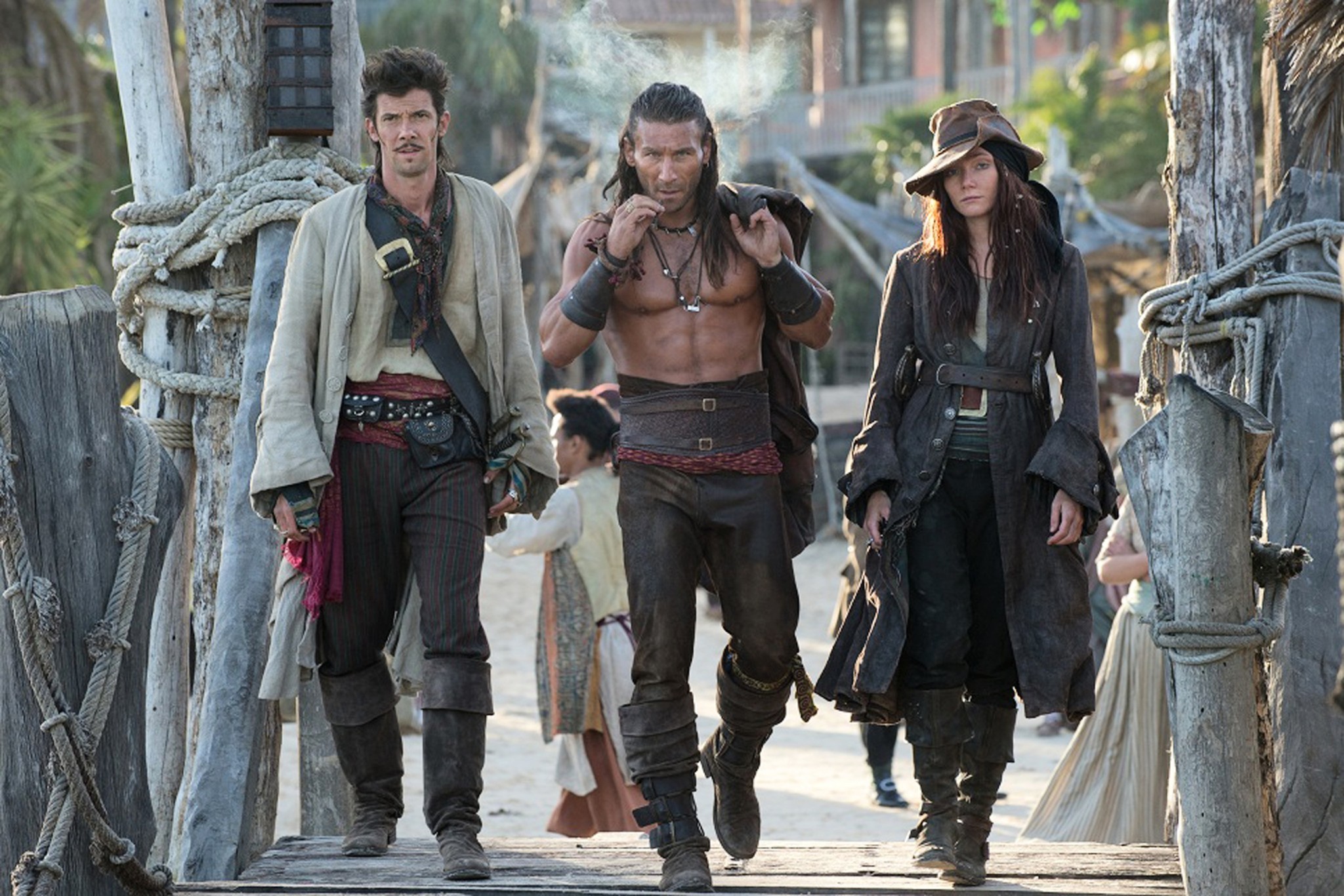*************** TV PREVIEW FOR JANUARY 5, 2014. DO NOT USE PRIOR TO PUBLICATION.**************From left, Toby Schmitz (Jack Rackham) Zach McGowan (Charles Vane) Clara Paget (Anne Bonny star in Starz Entertainment's series BLACK SAILS. Photo Credit: Starz Entertainment.