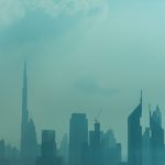 Dubai, UAE – October, 2018. Beautiful skyline of Dubai surrounded by sand dust at day light